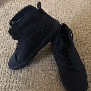 All Black high top Vans (OTW) edition.